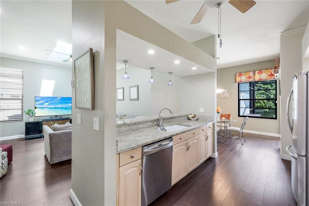 Dining room, Interior, Kitchen, Pendant Lights, Recessed Lighting, Stainless Steel Appliances, Wood Texture Flooring