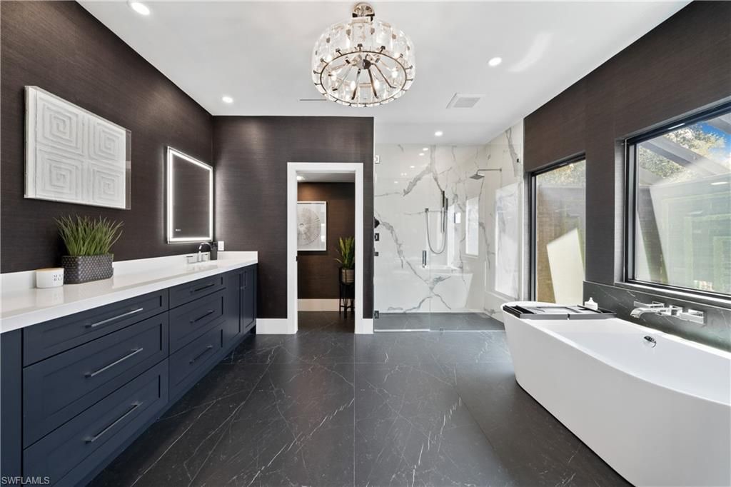 Bathroom, Dual Sink Vanities, Free Standing Baths, Glass Shower, Interior, Marble, Marble Walls, Recessed Lighting