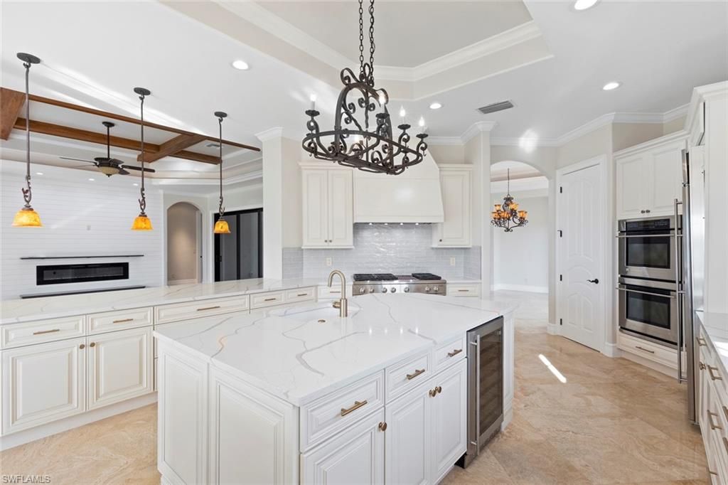 Chandelier, Interior, Kitchen, Pendant Lights, Recessed Lighting, Stainless Steel Appliances, Wooden Beams