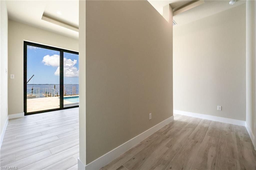 Empty room, Interior, Recessed Lighting, Water, Wood Texture Flooring