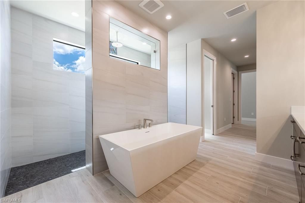 Bathroom, Free Standing Baths, Interior, Recessed Lighting, Wood Texture Flooring