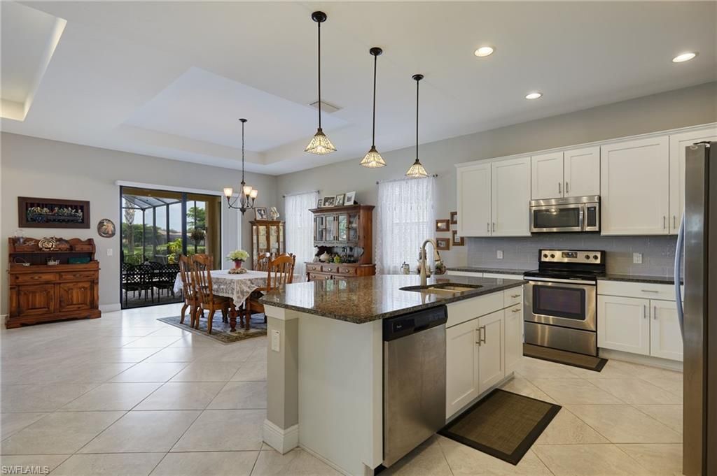 Chandelier, Dining room, Interior, Kitchen, Pendant Lights, Recessed Lighting, Stainless Steel Appliances