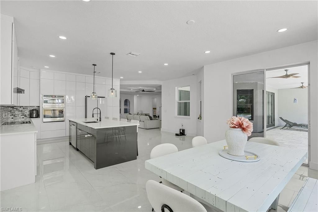 Dining room, Interior, Kitchen, Living room, Marble, Pendant Lights, Recessed Lighting, Stainless Steel Appliances