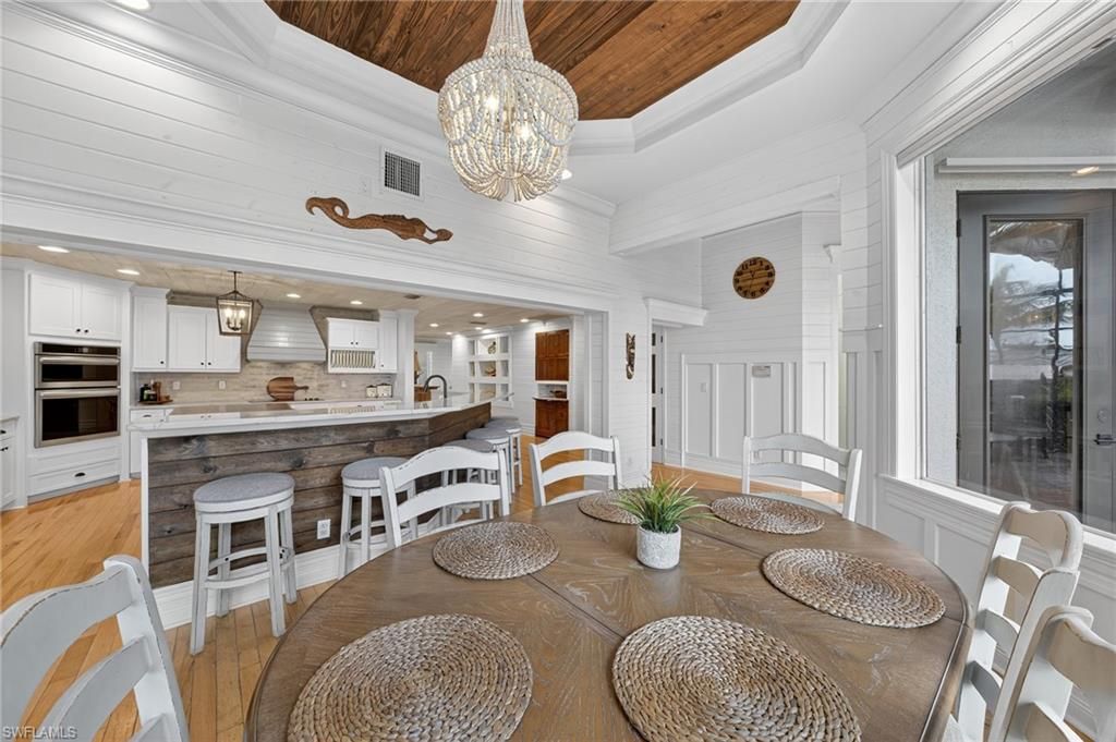 Chandelier, Dining room, Interior, Kitchen, Pendant Lights, Recessed Lighting, Wooden Ceilings, Wood Texture Flooring
