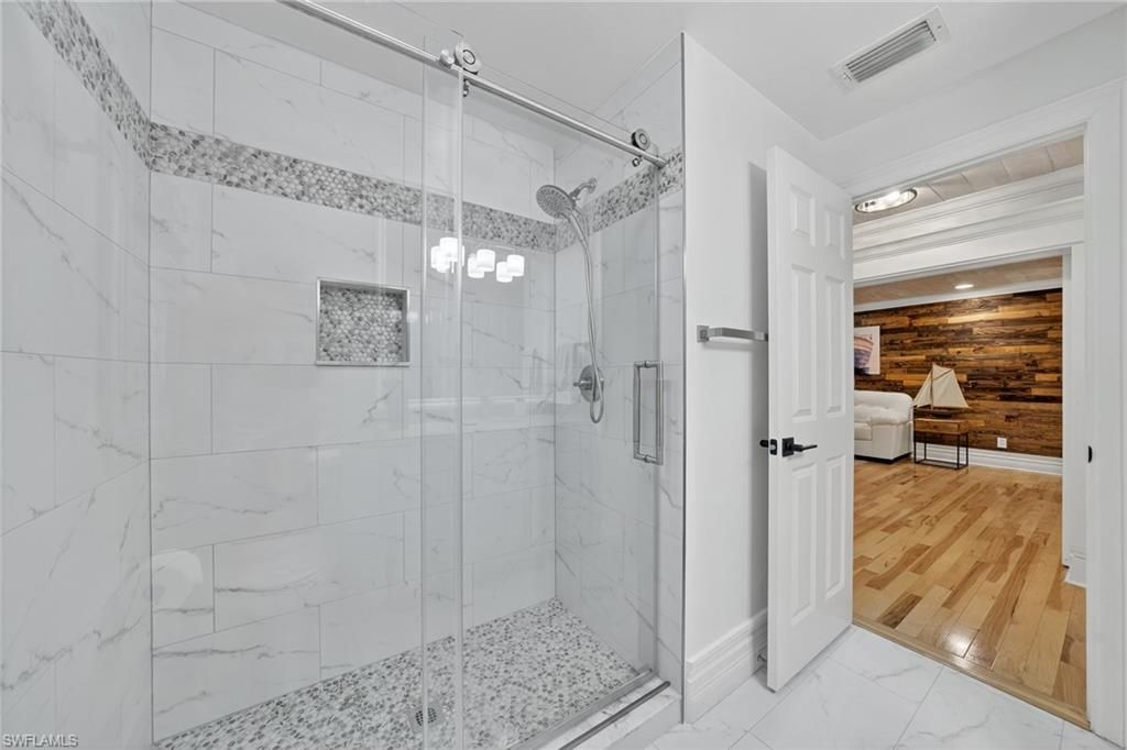 Bathroom, Glass Shower, Interior, Marble, Marble Walls, Recessed Lighting, Wood Texture Flooring