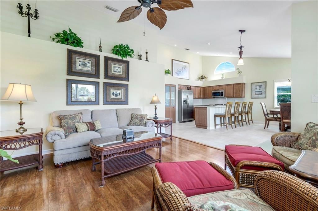 Dining room, Interior, Kitchen, Living room, Pendant Lights, Recessed Lighting, Stainless Steel Appliances, Wood Texture Flooring