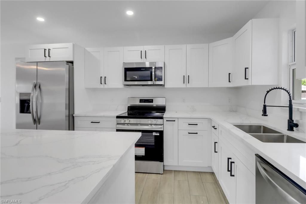 Interior, Kitchen, Recessed Lighting, Stainless Steel Appliances, Wood Texture Flooring
