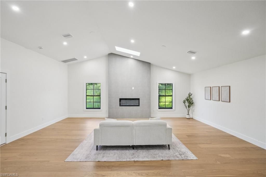 Fireplace, Interior, Living room, Recessed Lighting, Wood Texture Flooring