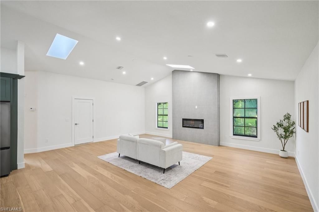 Fireplace, Interior, Recessed Lighting, Wood Texture Flooring