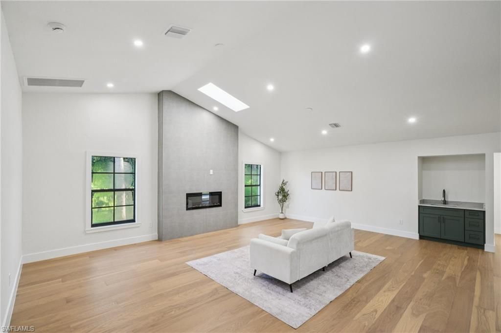 Fireplace, Interior, Living room, Recessed Lighting, Wood Texture Flooring