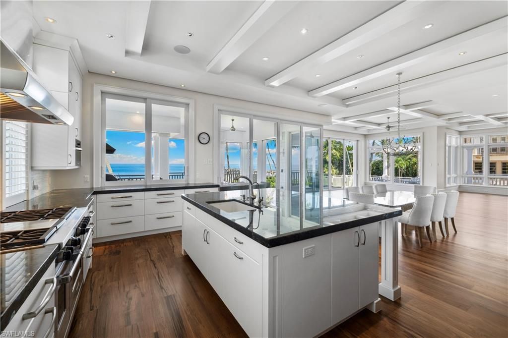 Dining room, Interior, Kitchen, Pendant Lights, Recessed Lighting, Stainless Steel Appliances, Water, Wood Texture Flooring