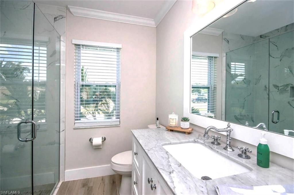 Bathroom, Glass Shower, Interior, Marble Walls, Wood Texture Flooring