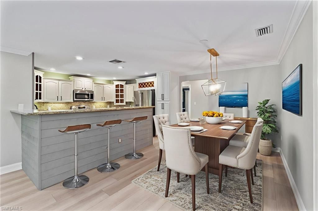Dining room, Interior, Kitchen, Pendant Lights, Recessed Lighting, Stainless Steel Appliances, Wood Texture Flooring