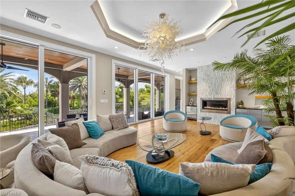 Chandelier, Fireplace, Interior, Living room, Recessed Lighting, Wood Texture Flooring