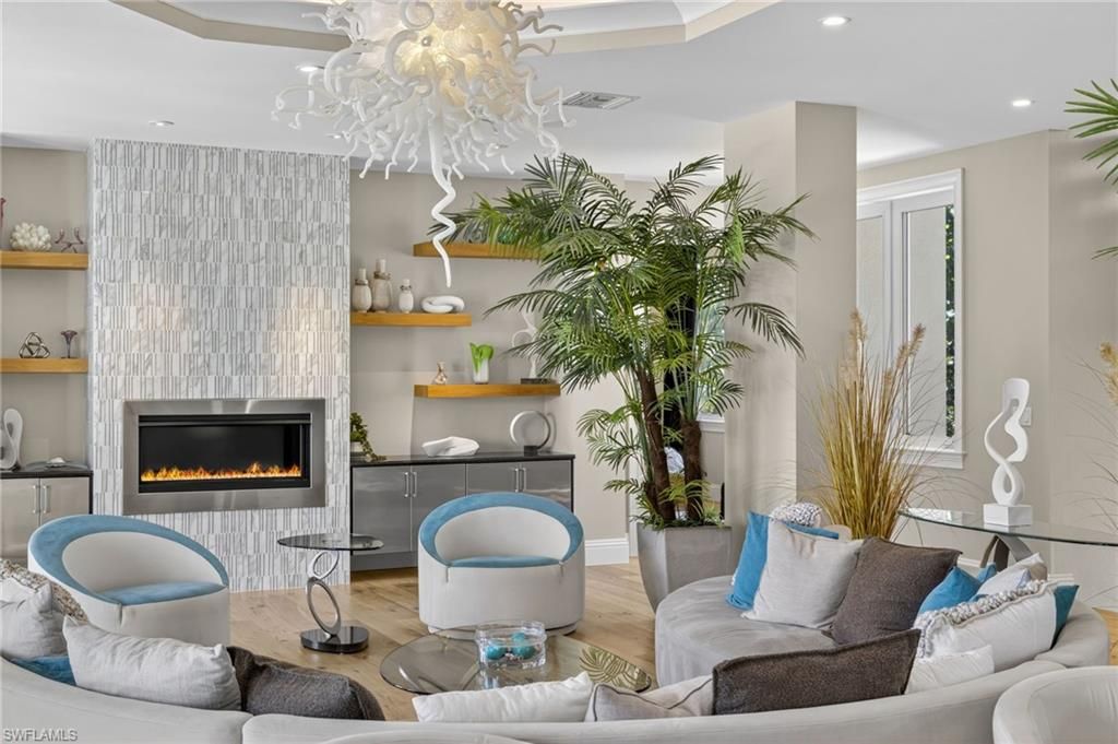 Chandelier, Fireplace, Interior, Living room, Recessed Lighting, Wood Texture Flooring