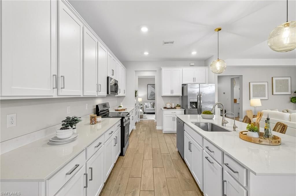 Interior, Kitchen, Pendant Lights, Recessed Lighting, Stainless Steel Appliances, Wood Texture Flooring