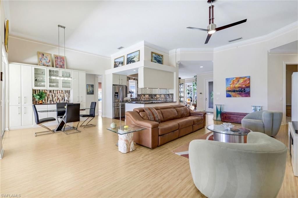 Dining room, Interior, Kitchen, Living room, Pendant Lights, Recessed Lighting, Stainless Steel Appliances, Wood Texture Flooring