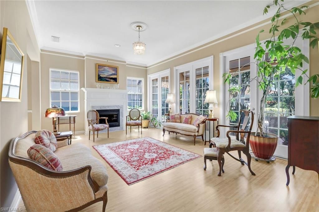 Chandelier, Fireplace, Interior, Living room, Pendant Lights, Recessed Lighting, Wood Texture Flooring