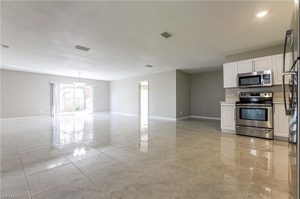 Chandelier, Empty room, Interior, Kitchen, Recessed Lighting, Stainless Steel Appliances