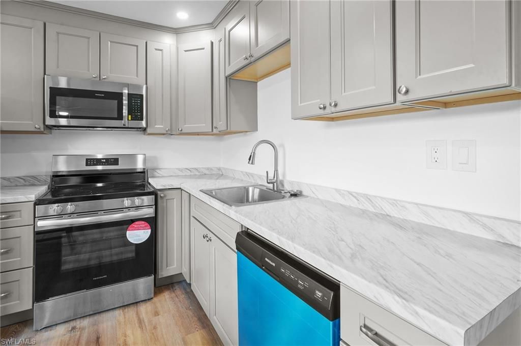 Interior, Kitchen, Recessed Lighting, Stainless Steel Appliances, Wood Texture Flooring