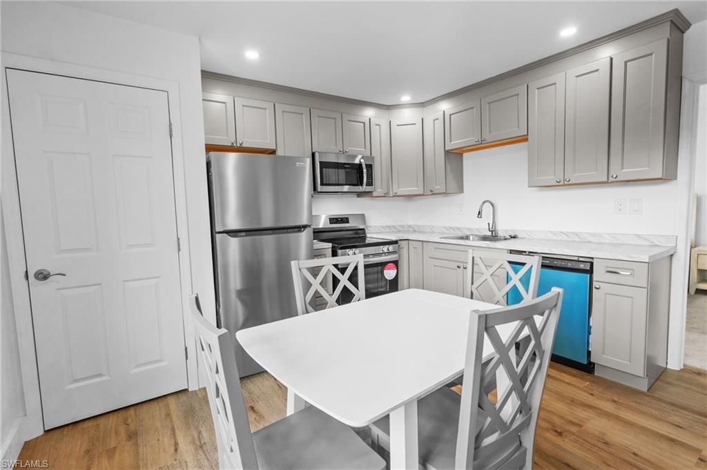 Interior, Kitchen, Recessed Lighting, Stainless Steel Appliances, Wood Texture Flooring