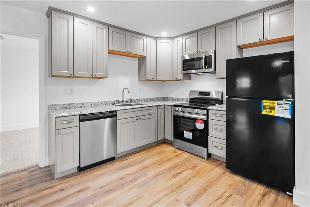 Interior, Kitchen, Recessed Lighting, Stainless Steel Appliances, Wood Texture Flooring