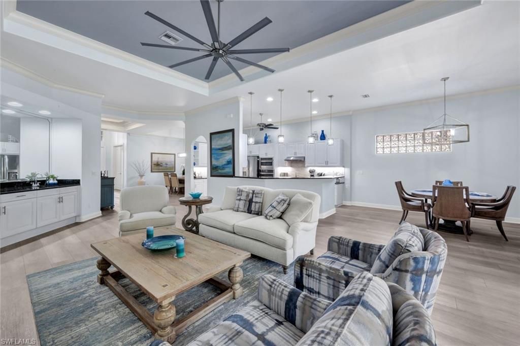 Dining room, Interior, Kitchen, Living room, Pendant Lights, Recessed Lighting, Stainless Steel Appliances, Wood Texture Flooring