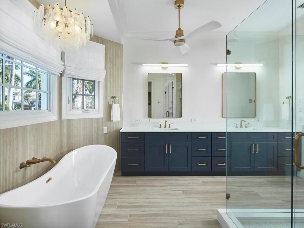 Bathroom, Dual Sink Vanities, Free Standing Baths, Glass Shower, Interior, Wood Texture Flooring