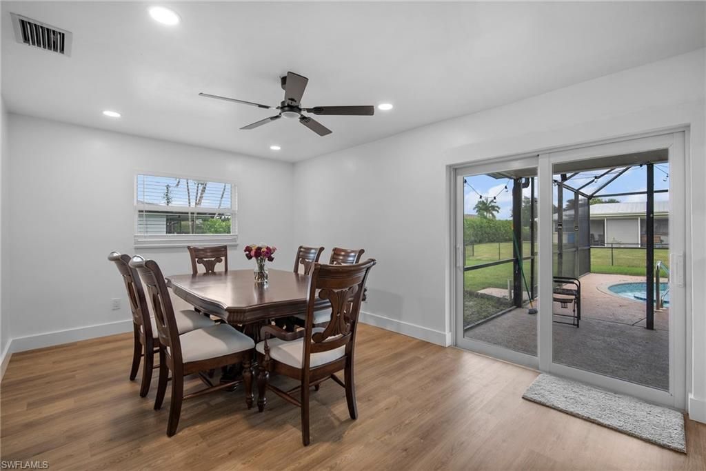 Dining room, Interior, Recessed Lighting, Sun Room, Wood Texture Flooring