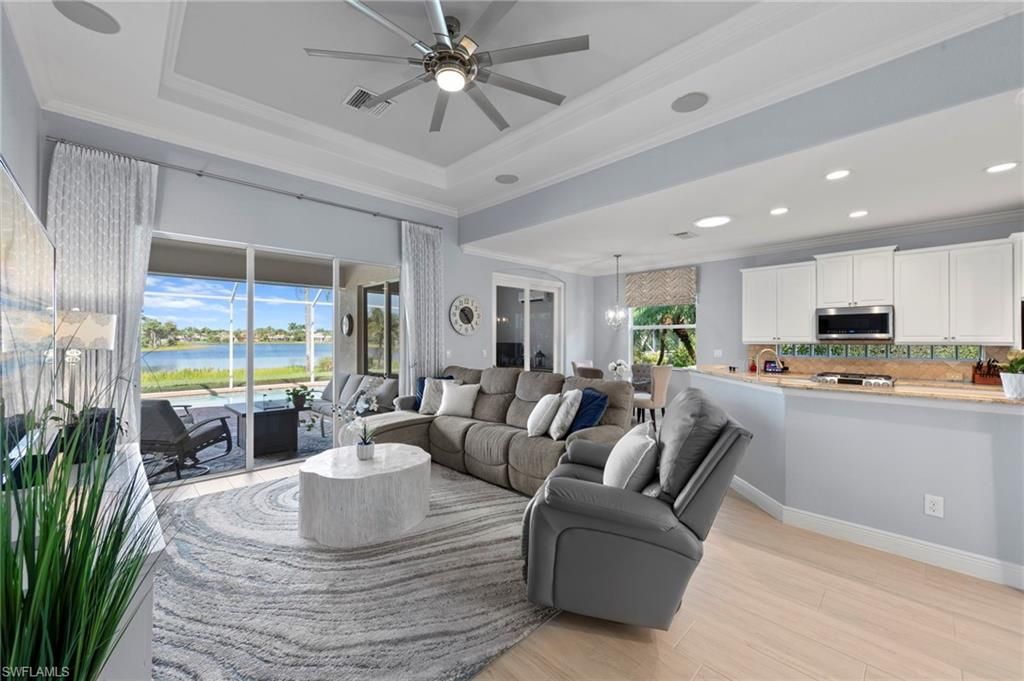 Dining room, Interior, Kitchen, Living room, Pendant Lights, Recessed Lighting, Stainless Steel Appliances, Water, Wood Texture Flooring