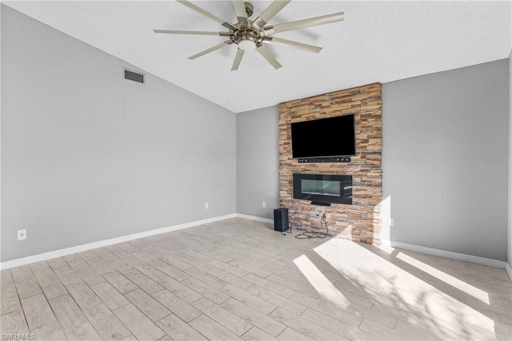 Empty room, Fireplace, Interior, Stone Walls, Wood Texture Flooring