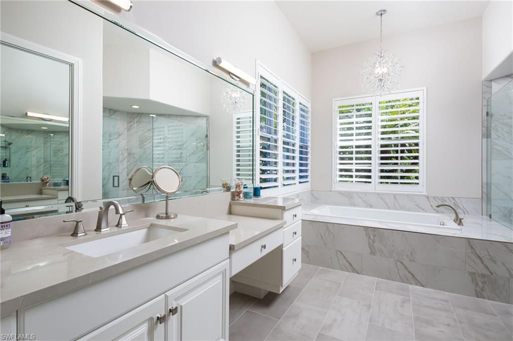 Bathroom, Chandelier, Dual Sink Vanities, Interior, Marble Walls, Pendant Lights