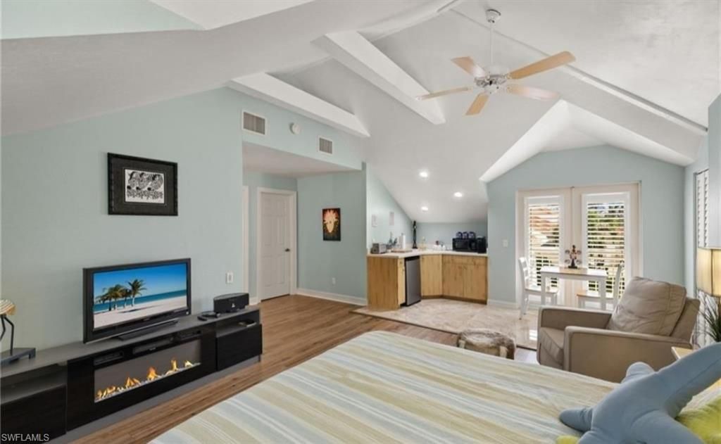 Bedroom, Fireplace, Interior, Living room, Recessed Lighting, Wood Texture Flooring