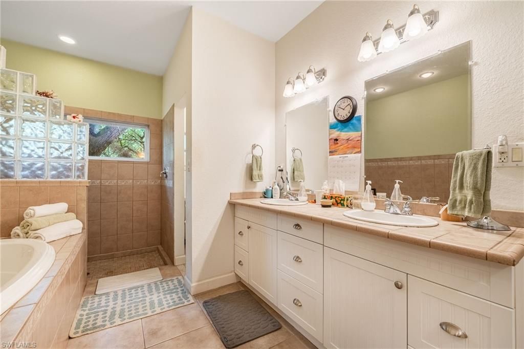 Bathroom, Dual Sink Vanities, Interior, Recessed Lighting, Tile Countertops