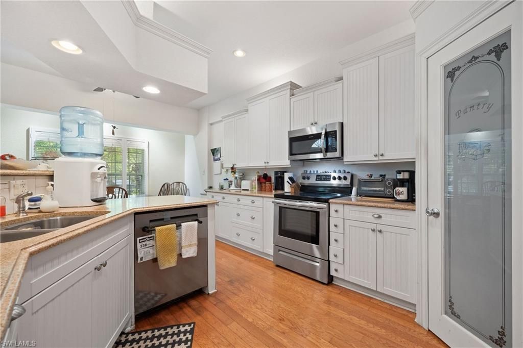 Interior, Kitchen, Recessed Lighting, Stainless Steel Appliances, Wood Texture Flooring