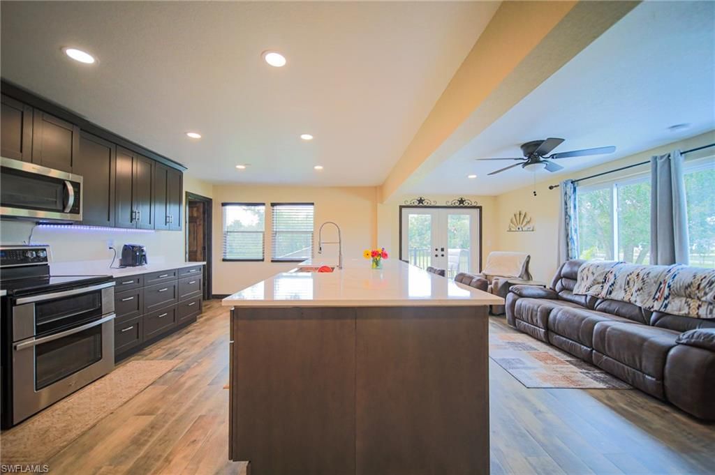 Interior, Kitchen, Living room, Recessed Lighting, Stainless Steel Appliances, Wood Texture Flooring