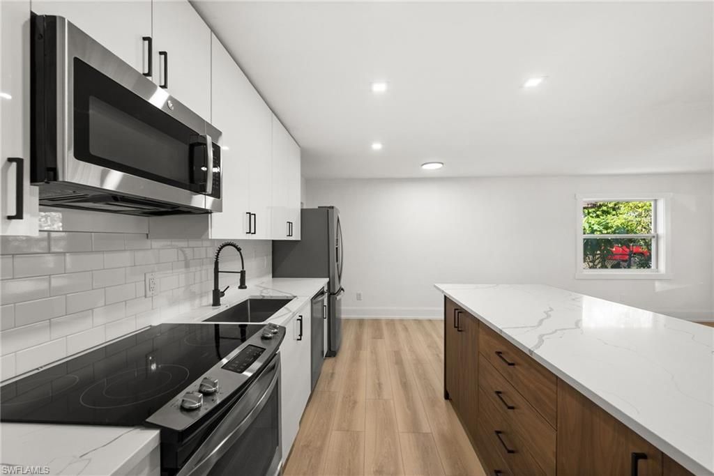Interior, Kitchen, Recessed Lighting, Stainless Steel Appliances, Wood Texture Flooring