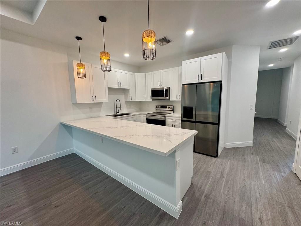 Interior, Kitchen, Pendant Lights, Recessed Lighting, Stainless Steel Appliances, Wood Texture Flooring