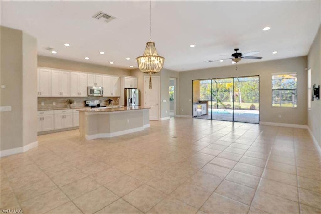 Chandelier, Empty room, Interior, Kitchen, Pendant Lights, Recessed Lighting, Stainless Steel Appliances