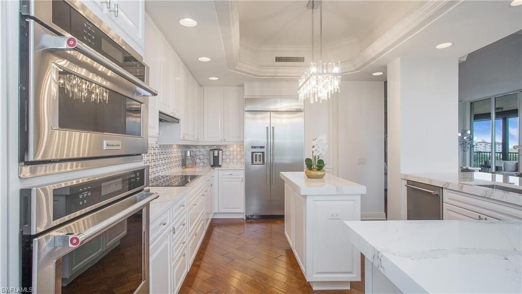 Chandelier, Interior, Kitchen, Pendant Lights, Recessed Lighting, Stainless Steel Appliances, Wood Texture Flooring
