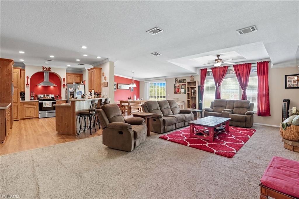 Dining room, Interior, Kitchen, Living room, Pendant Lights, Recessed Lighting, Stainless Steel Appliances, Wood Texture Flooring