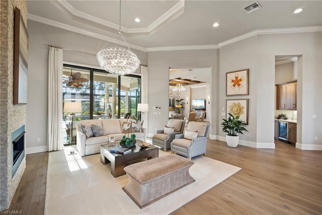 Chandelier, Fireplace, Interior, Living room, Pendant Lights, Recessed Lighting, Wood Texture Flooring