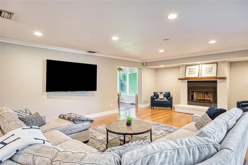 Fireplace, Interior, Living room, Recessed Lighting, Wood Texture Flooring
