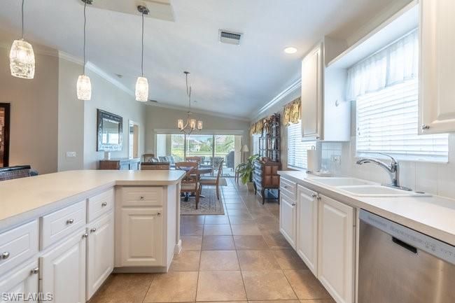 Chandelier, Dining room, Interior, Kitchen, Pendant Lights, Recessed Lighting, Stainless Steel Appliances