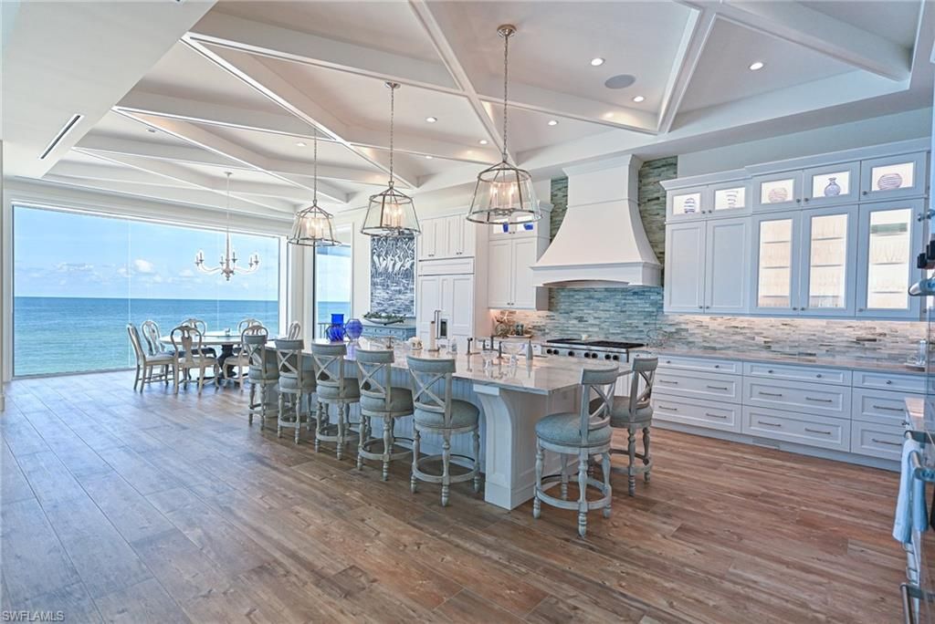 Dining room, Interior, Kitchen, Pendant Lights, Recessed Lighting, Stainless Steel Appliances, Water, Wood Texture Flooring