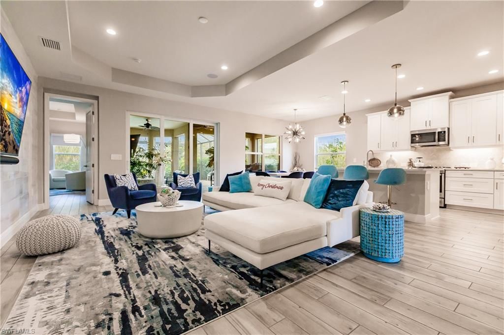 Dining room, Interior, Kitchen, Living room, Pendant Lights, Recessed Lighting, Stainless Steel Appliances, Wood Texture Flooring