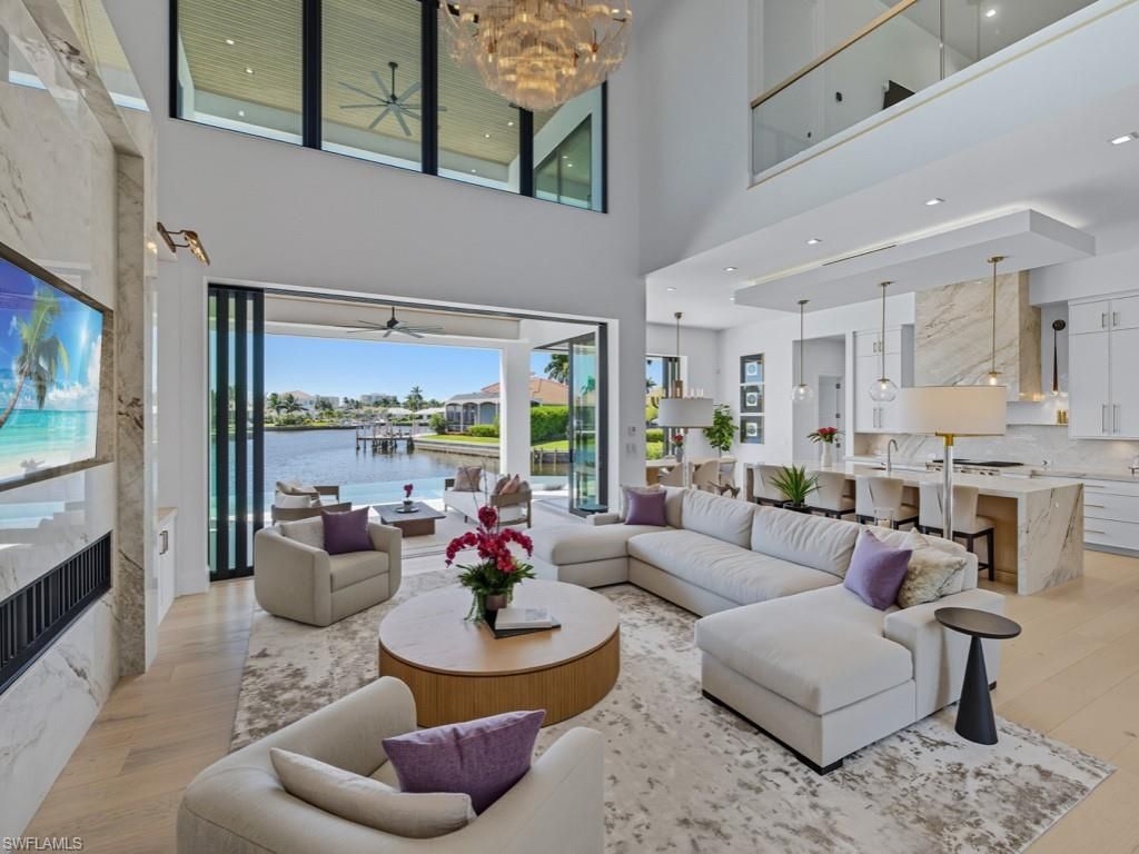 Chandelier, Dining room, Interior, Living room, Pendant Lights, Recessed Lighting, Water, Wood Texture Flooring