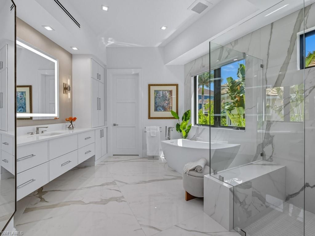 Bathroom, Dual Sink Vanities, Free Standing Baths, Glass Shower, Interior, Marble, Marble Walls, Recessed Lighting