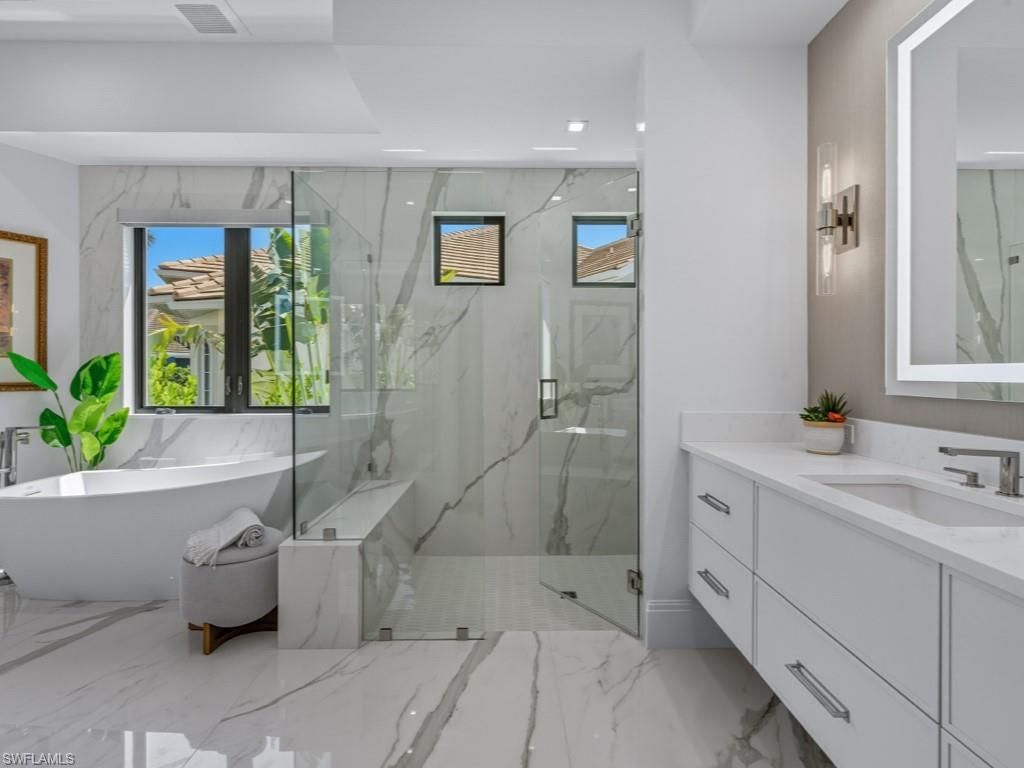 Bathroom, Dual Sink Vanities, Free Standing Baths, Glass Shower, Interior, Marble, Marble Walls, Recessed Lighting