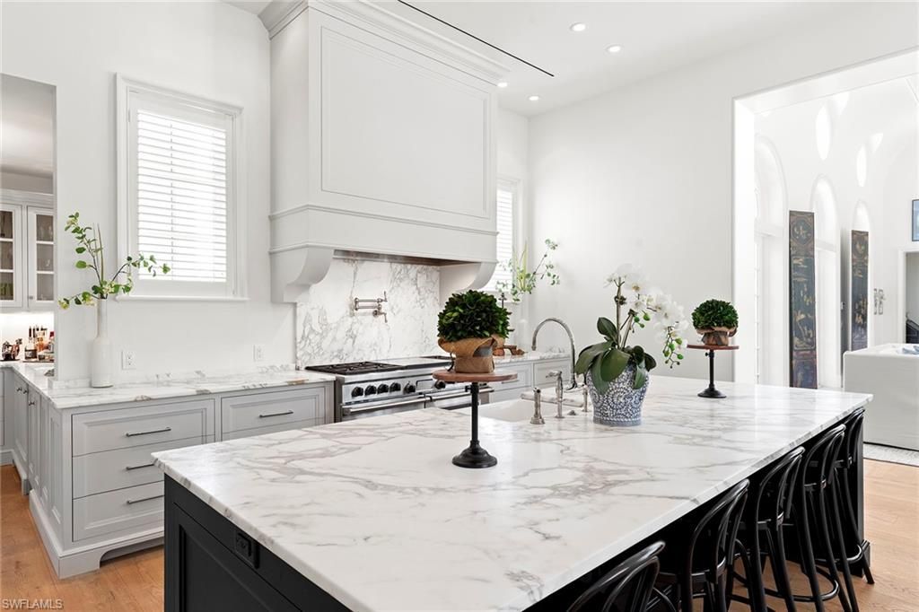 Interior, Kitchen, Marble Walls, Recessed Lighting, Stainless Steel Appliances, Wood Texture Flooring
